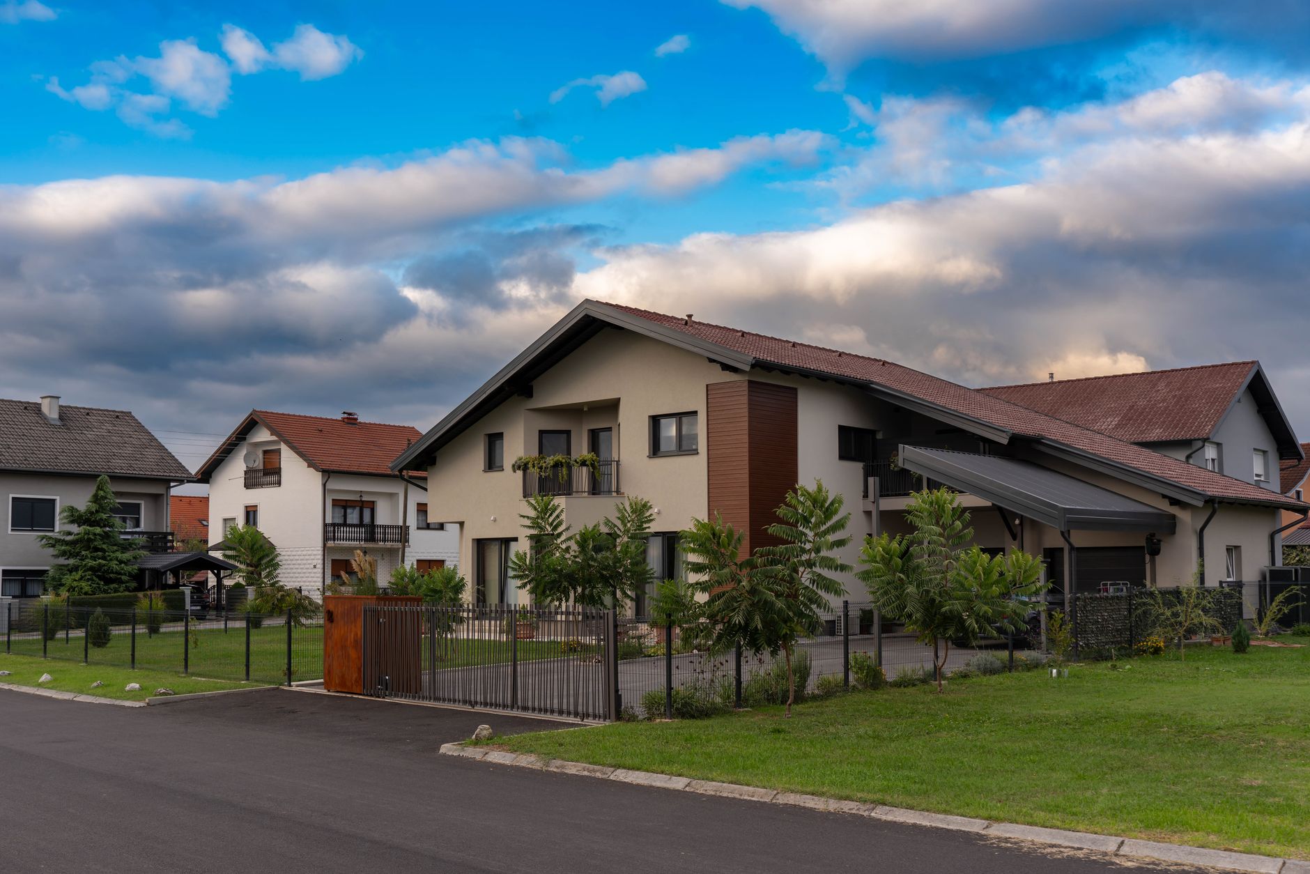 Aerial view of a gated community in Nairobi with luxury homes and manicured lawns.